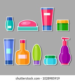 Vector set of bright cosmetic tubes. Cartoon bathroom bottles. Cute multicolored spa jars. Colorful beauty stickers on a gray background