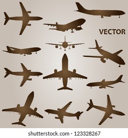 Vector set of brown planes or airplanes flying isolated on beige background