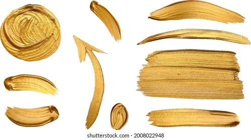 vector set of brush strokes of gold paint. Design elements paint strokes circles, lines, dots, blots, stains
