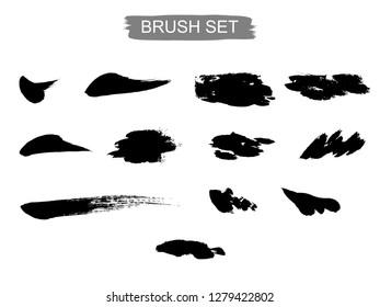 Vector set of brushes and mascara spots