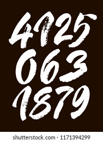 vector set of calligraphic acrylic or ink numbers.  for your design, brush lettering on a black background