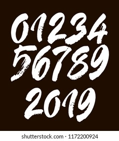 vector set of calligraphic acrylic or ink numbers. for your design, brush lettering on a black background