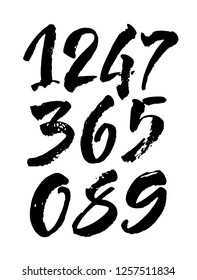 vector set of calligraphic acrylic or ink numbers. ABC for your design, brush lettering on a black background
