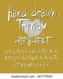 vector set of calligraphic acrylic or ink alphabet. ABC for your design. Hand drawn trendy alphabet. Gold background.