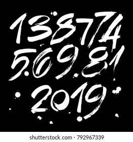 vector set of calligraphic acrylic or ink numbers. ABC for your design, brush lettering on a black background with blots