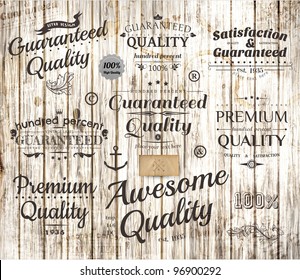 vector set of calligraphic design elements, page decoration, Premium Quality, Awesome and Satisfaction Guarantee Label collection, Vintage wood background