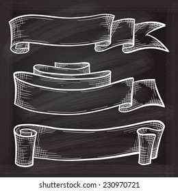 Vector set of chalk doodle scrolls and ribbons on the chalkboard background