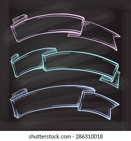 Vector set of chalk doodle scrolls and ribbons on the chalkboard