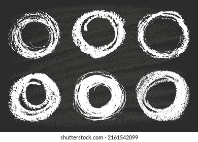 Vector set of chalk hand drawn circles, round design elements on black board. Abstract freehand  white empty circles as blank stamp, seal, frame, grunge background. Vector illustration EPS10
