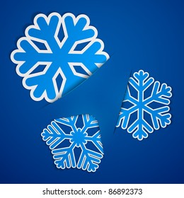 Conjunto vectorial de copos de nieve de papel azul de navidad.