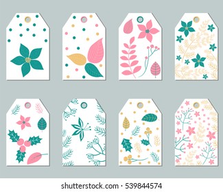 Vector set of Christmas gift tags with foliage - poinsettia leaves, branches, flowers and berries in pink and green colors 