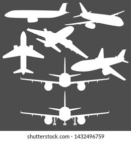Vector Set of Civil Airplanes. White Silhouettes on Black Background