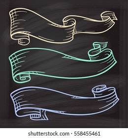 Vector set of color chalk doodle scrolls and ribbons on the chalkboard background