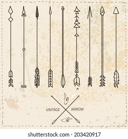 Vector set of colorful ethnic arrows on textured background