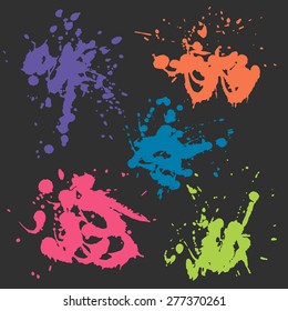 vector set of colorful stains isolated on dark background