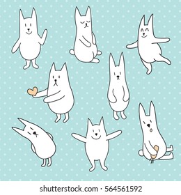 vector set of cute rabbits on polka dotted light blue background
