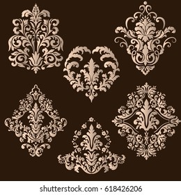 Vector set of damask ornamental elements. Elegant floral abstract elements for design. Perfect for invitations, cards etc.
