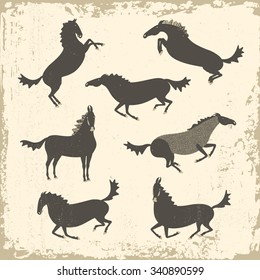 Vector set of dark grey horses in different poses