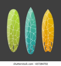 Vector set of decorated colorful surfboards. Different shapes and types isolated on dark background. Surfboard prints design collection.