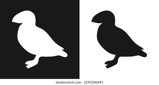 Vector set of decorative, detailed, isolated puffin penguins in black on a white background