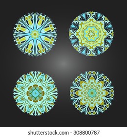 Vector set of decorative round ornaments. Design elements in yellow and light  blue colors.