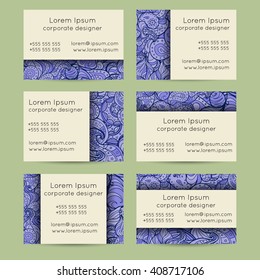 Vector set of delicate hand drawn boho doodle paisley business card template designs. Floral design template.