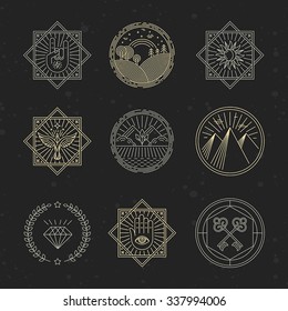 Vector set of design elements, emblems and logo design templates - concepts related to tattoo, magic, alchemy in trendy linear style on black background