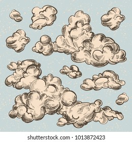 Vector set of detailed hand drawn vintage engraved clouds. Ink illustration. Overcast, abstract sky, cloud sketch decorative retro background. 
