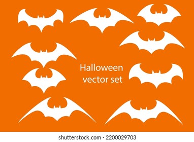 Vector set of different Halloween bats. Halloween flying bats. Vampire vector bat. Dark silhouette of bat flying in a flat style