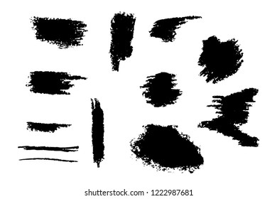 Vector set of dirty strokes isolated on white. Abstract spots.