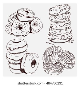 Vector set of donuts. Sketch drawn by hand.Donut cakes food hand drawn sketch. Donut cakes pastry vector sketch style. Tasty donut cakes pastry food vector sketch style.