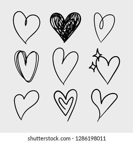 Vector set of doodle hand drawn isolated hearts icons. Design elements