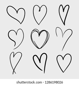 Vector set of doodle hand drawn isolated hearts icons. Design elements