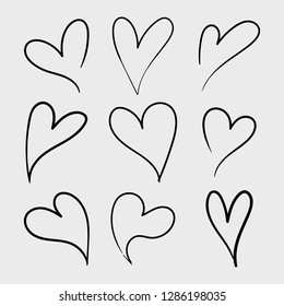 Vector set of doodle hand drawn isolated hearts icons. Design elements