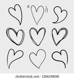 Vector set of doodle hand drawn isolated hearts icons. Design elements