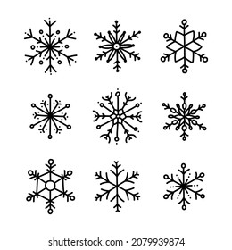 Vector set with doodle snowflakes. Black snowflakes isolated on white background.