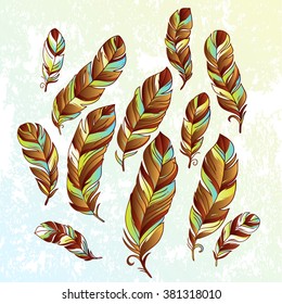 Vector Set of Ethnic feathers. Vintage tribal feathers.  Can be used for cards, invitations, fabrics, wallpapers, ornamental template for design and decoration.
