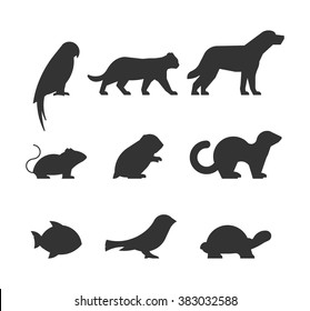 Vector set of figures of pets. Silhouettes parrot, cat, dog, mouse, hamster, ferret, fish, canary and turtle.