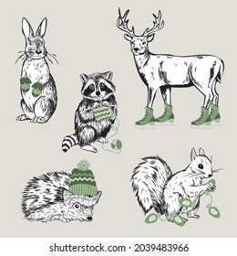 Vector set of five hand drawn, vintage-style woodland animals who are holding various green colored winter or holiday items. 