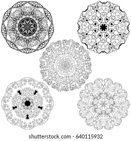 Vector set from five round black and white mandalas. Ethnic decorative elements. Hand drawn mandalas.