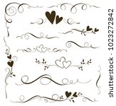 Vector set of floral calligraphic elements, dividers and love ornaments for page decoration and frame design. Decorative heart silhouette for wedding cards and invitations. 

