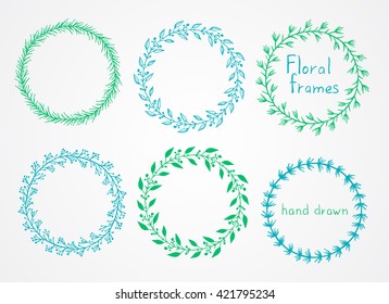 Vector set of floral hand drawn round frames. In blue and green colors.