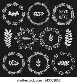 Vector set of floral wreathes on the chalkboard. Decorative round frames, branches and leaves for your design. Rustic style.
