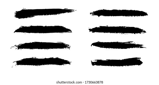 Vector set of freehand brush strokes. Abstract black elements, isolated on white background. Ink splashes with grunge texture 