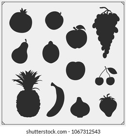 Vector set of fruits and berries silhouettes isolated on white background.