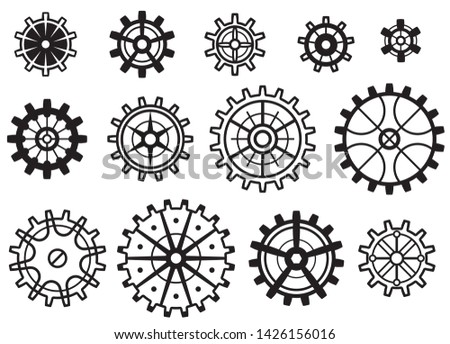 Vector set of gears, cogwheels with uniform cogs / equal teeth, but different diameters.  Suitable for synchronous animation. Isolated black shapes on white background.