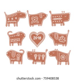 Vector set of gingerbread dogs. Hand drawn cute dogs cookie with doodle ornament. New year style pastry. 