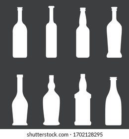 Vector Set of Glass Bottle White Silhouettes on Dark Background