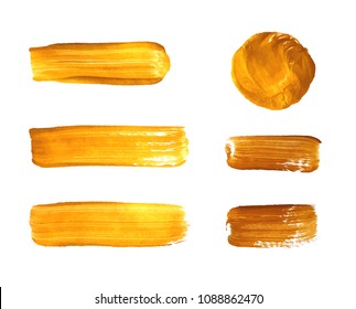 Vector Set of Gold Paint Smears, Golden Brush Strokes Isolated on White Background.