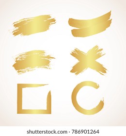 Vector set of golden grunge brush paint strokes
